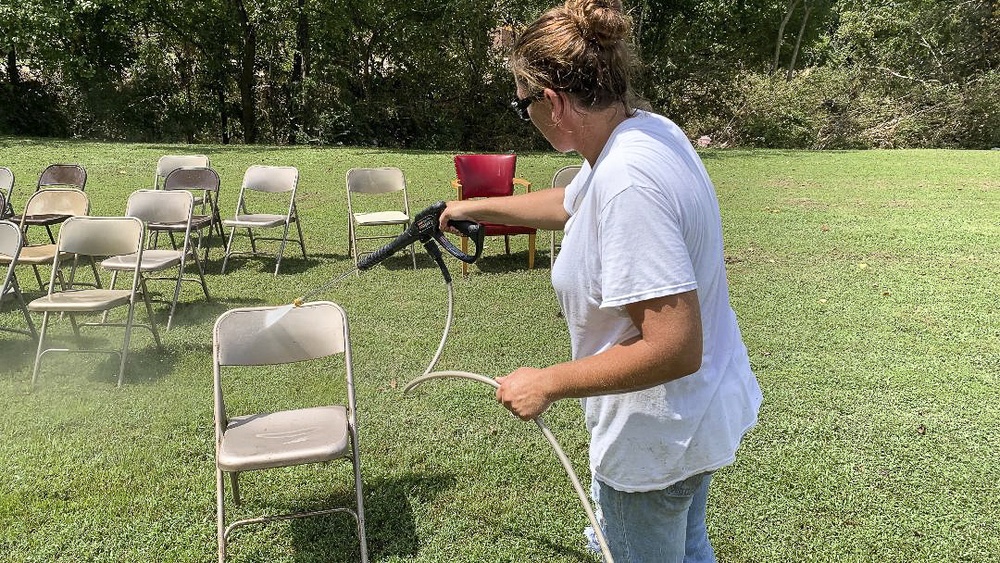 Power Washing Muddy Chairs For Outdoor Services at Damaged Church