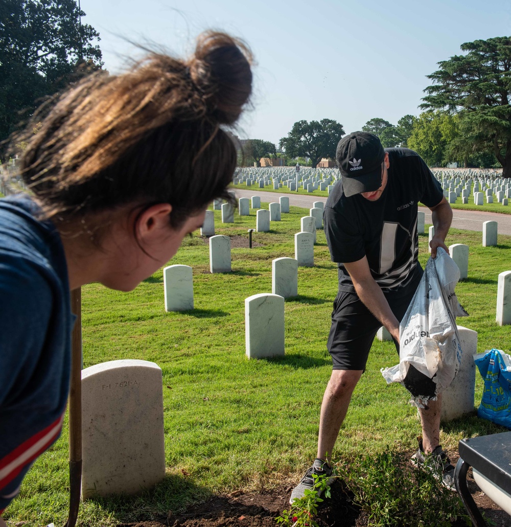 Sailors plant flowers