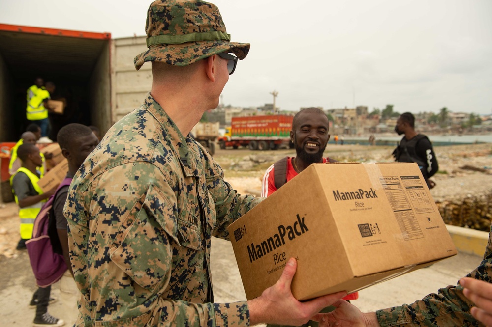 USS Arlington Sailors And Marines Deliver Aid To Jeremie