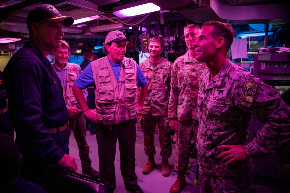 Rear Adm. Davids Tours The Combat Information Center Onboard USS Arlington