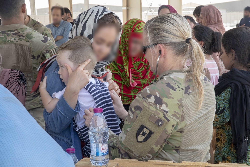 Soldiers Provide Medical Support in Afghanistan Evacuation Efforts in Qatar