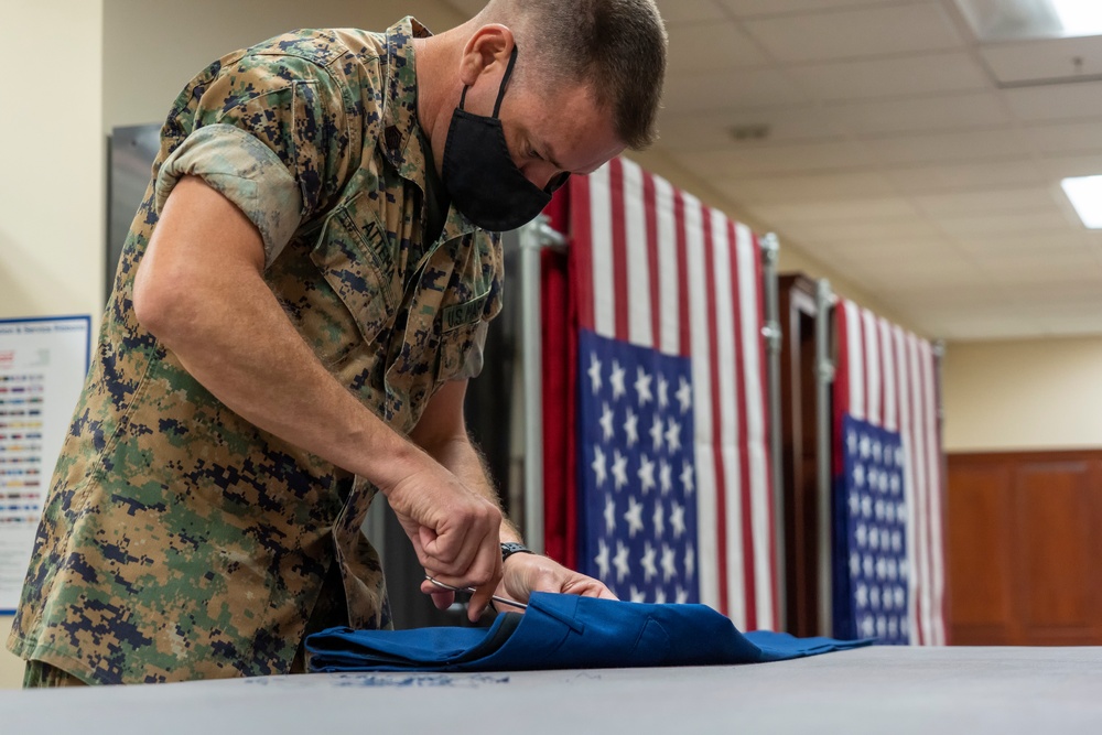 Uniforms prepared for fallen Marines at Air Force Mortuary Affairs Operations