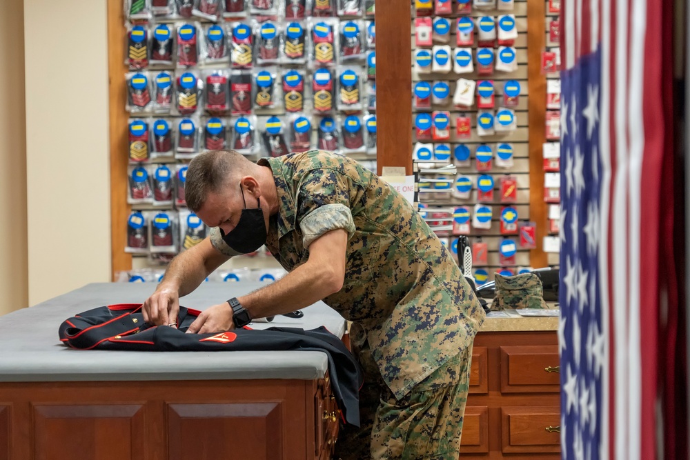 Uniforms being prepared for fallen Marines at Air Force Mortuary Affairs Operations