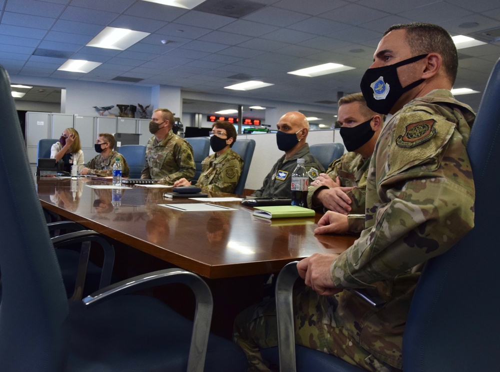Senior mobility leaders watch as the final flight departs from Afghanistan