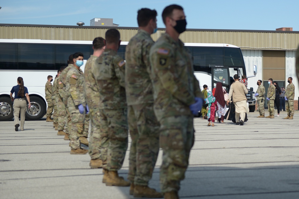 Afghan evacuees arrive in Indiana, head to Camp Atterbury