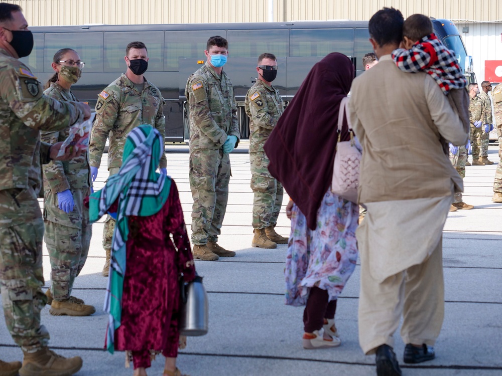 Afghan evacuees arrive in Indiana, head to Camp Atterbury