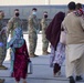 Afghan evacuees arrive in Indiana, head to Camp Atterbury