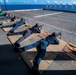 Sailors assigned to the forward deployed amphibious assault ship USS America participate in rifle qualifications.