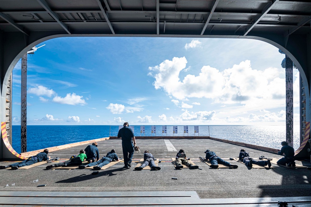 Sailors assigned to the forward deployed amphibious assault ship USS America participate in a fueling-at-sea.