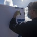 Sailors assigned to the forward deployed amphibious assault ship USS America participate in a fueling-at-sea.