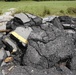 Black-Top and Guard Rail Pushed Aside After Repair