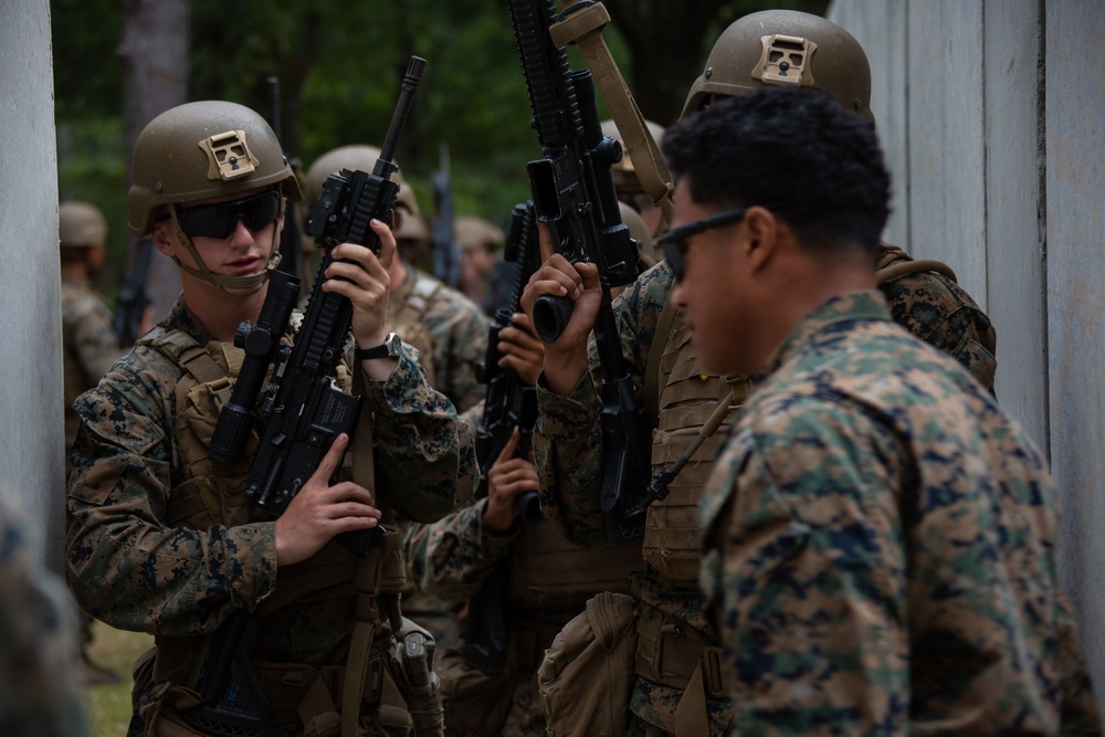 Infantry Marine Course students conduct training in a shoot house