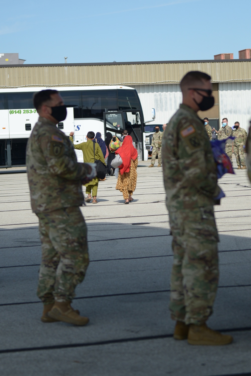 Afghan evacuees arrive in Indiana, head to Camp Atterbury