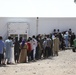 Serving hot meals to Afghan evacuees
