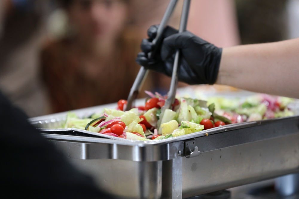 Serving hot meals to Afghan evacuees