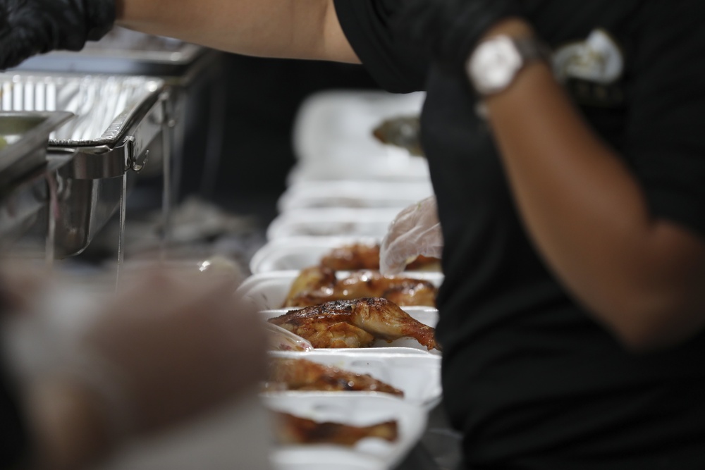 Serving hot meals to Afghan evacuees