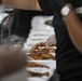 Serving hot meals to Afghan evacuees