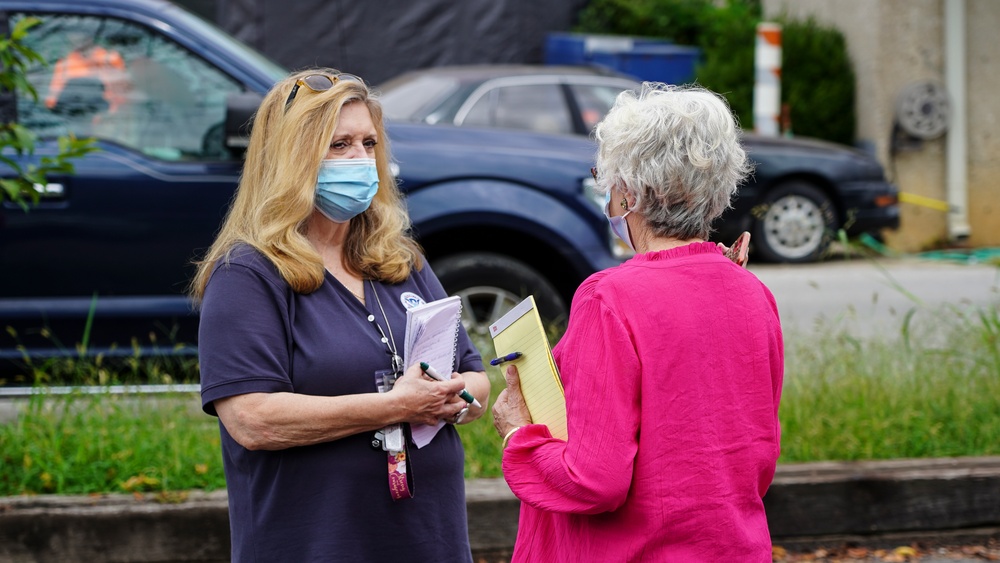 Local Flood Survivor Speaks With FEMA Representative