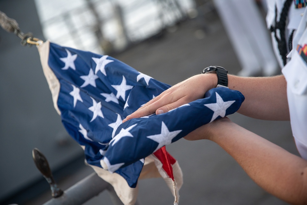 U.S. Marines, Sailors aboard USS Pearl Harbor honor fallen Sailor with memorial