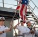 U.S. Marines, Sailors aboard USS Pearl Harbor honor fallen Sailor with memorial