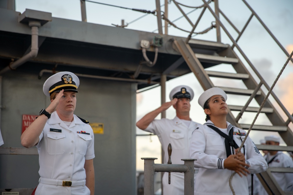 U.S. Marines, Sailors aboard USS Pearl Harbor honor fallen Sailor with memorial