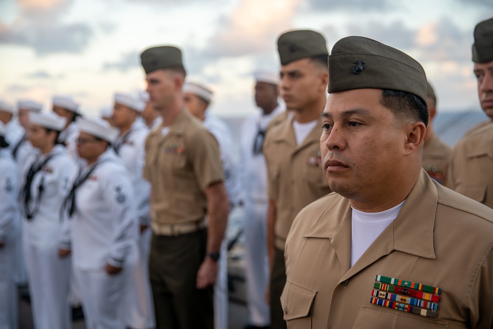 U.S. Marines, Sailors aboard USS Pearl Harbor honor fallen Sailor with memorial