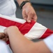 U.S. Marines, Sailors aboard USS Pearl Harbor honor fallen Sailor with memorial