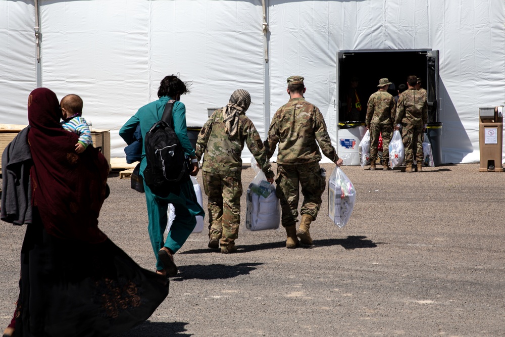 Afghan personnel arrive to Task Force – Holloman, check in temporary housing