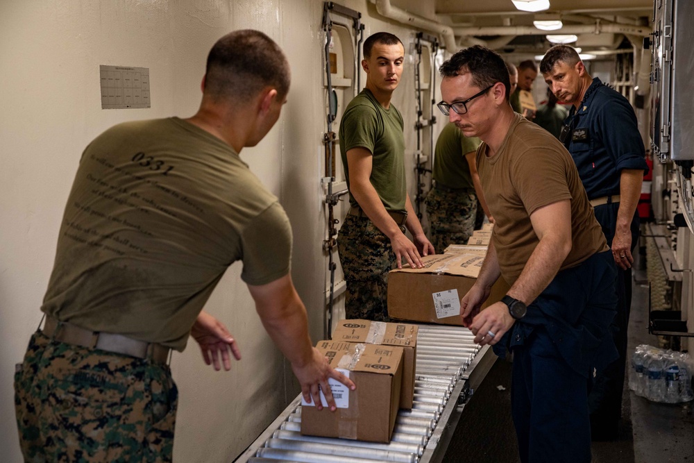 USS Arlington Receives Stores During a Replenishment-at-Sea