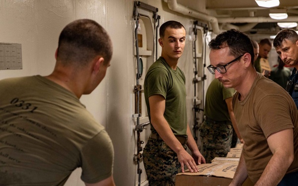 USS Arlington Receives Stores During a Replenishment-at-Sea