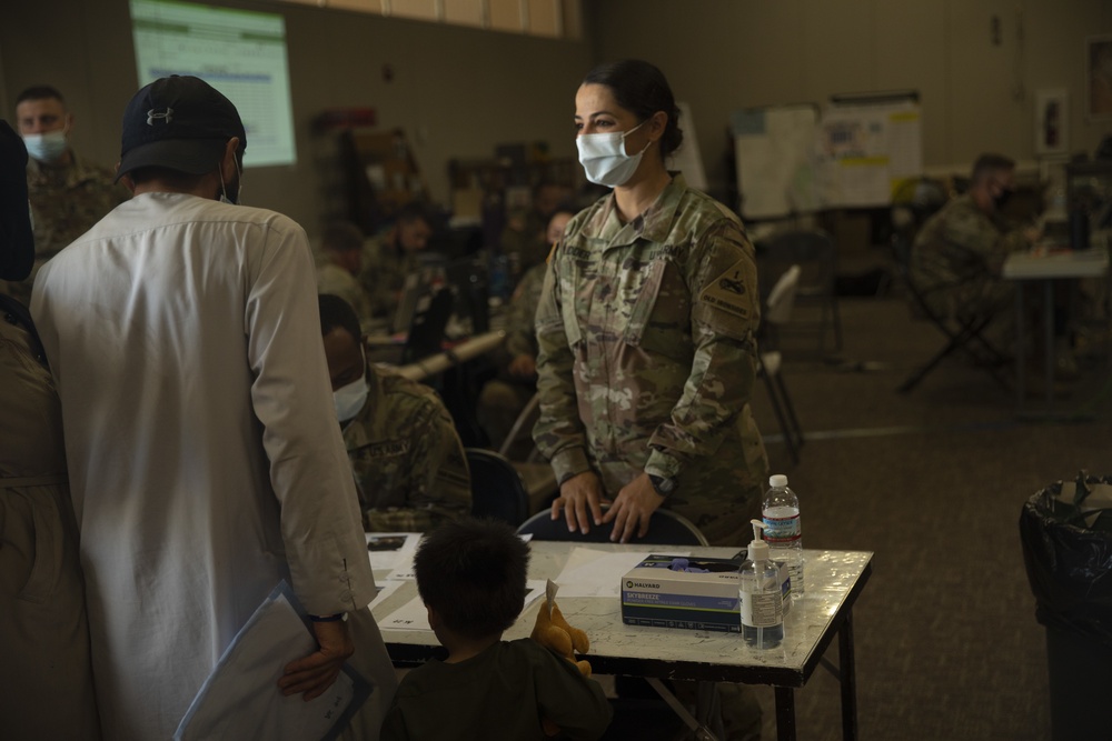 One soldier’s past, Afghan evacuees’ present