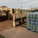 Soldiers deliver water to Afghan evacuees