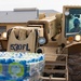Soldiers deliver water to Afghan evacuees