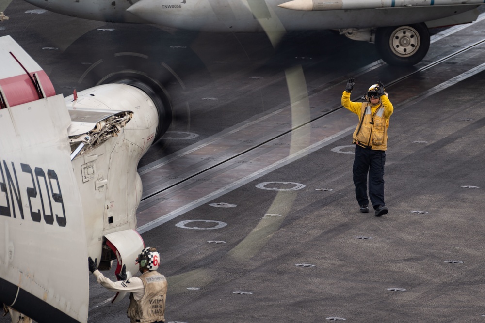 USS Carl Vinson (CVN 70) Sailors Prepare An E-2D Advanced Hawkeye For Launch Off The Flight Deck