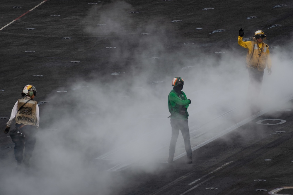 USS Carl Vinson (CVN 70) Sailors Launch An Aircraft Off The Flight Deck