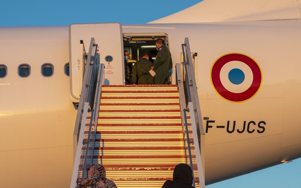 Evacuees depart NAVSTA Rota for the United States