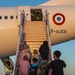 Evacuees depart NAVSTA Rota for the United States