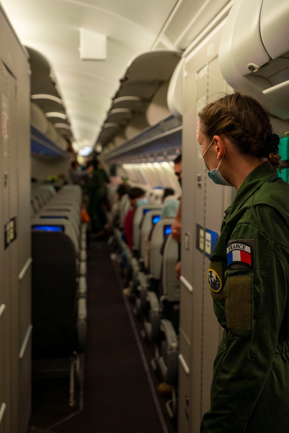 Evacuees depart NAVSTA Rota for the United States