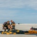 US Army Parachute Team Soldier packs parachute at the Cleveland Airshow