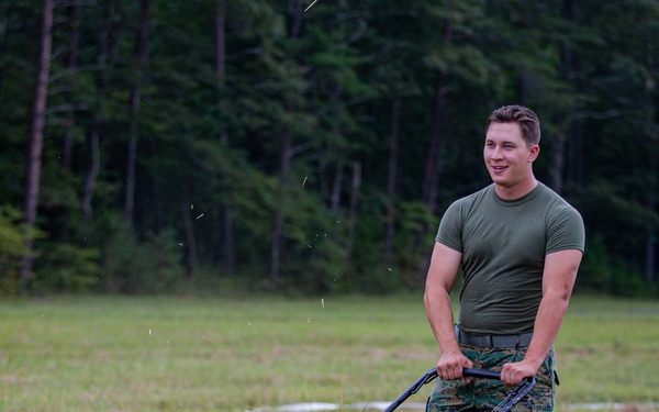 Mowing Grass for New Afghan Temporary Housing Sites