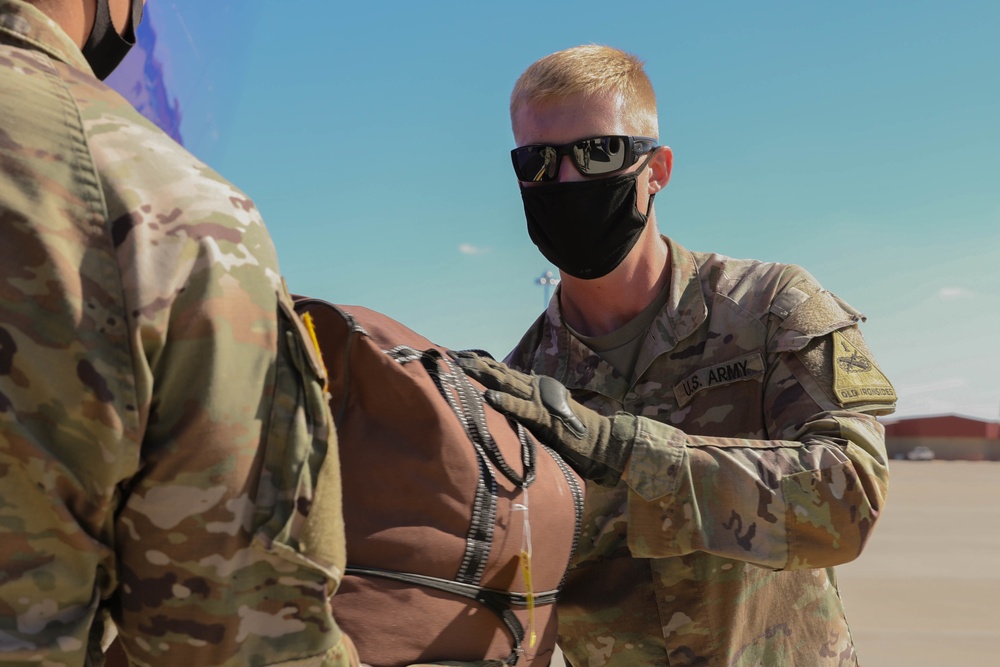 1st Armored Division soldiers assist Afghan evacuees