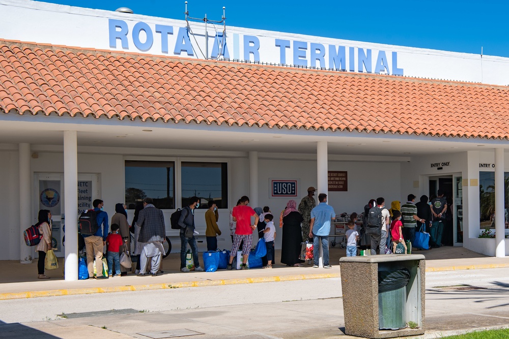 Evacuees depart NAVSTA Rota for the United States