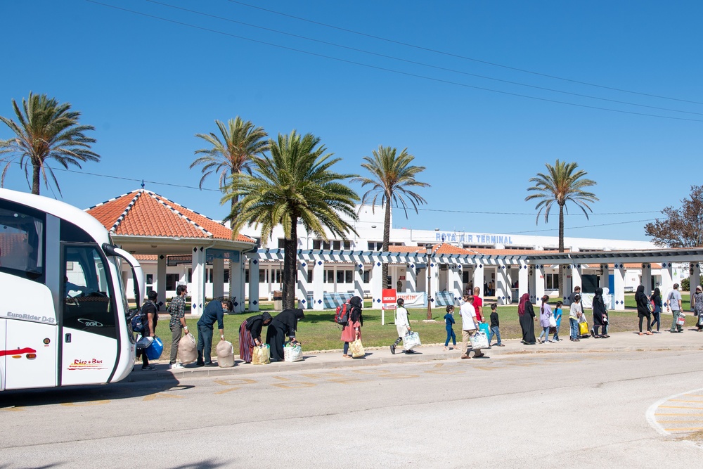 Evacuees depart NAVSTA Rota for the United States