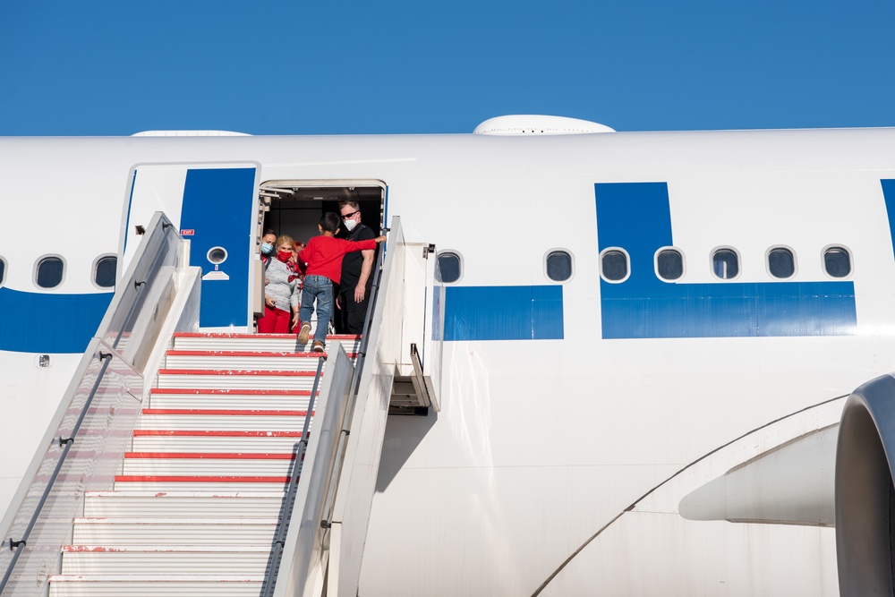 Evacuees depart NAVSTA Rota for the United States