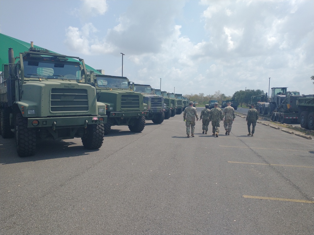 Naval Mobile Construction Battalion 133 readies vehicles to support Task Force 51