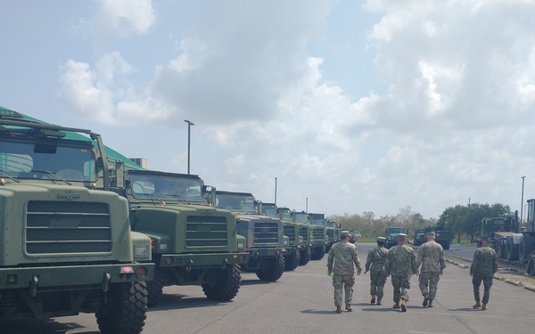 Naval Mobile Construction Battalion 133 readies vehicles to support Task Force 51