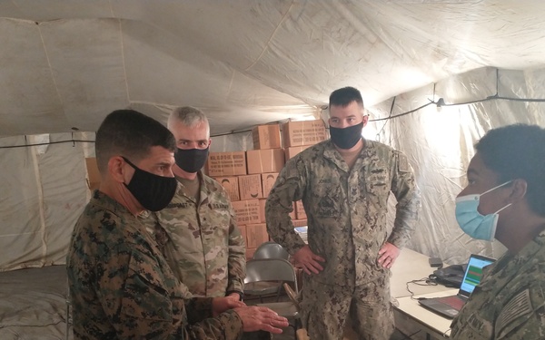 Naval Mobile Construction Battalion 133 readies vehicles to support Task Force 51