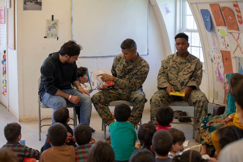 Marines read to Afghan Children