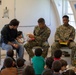Marines read to Afghan Children