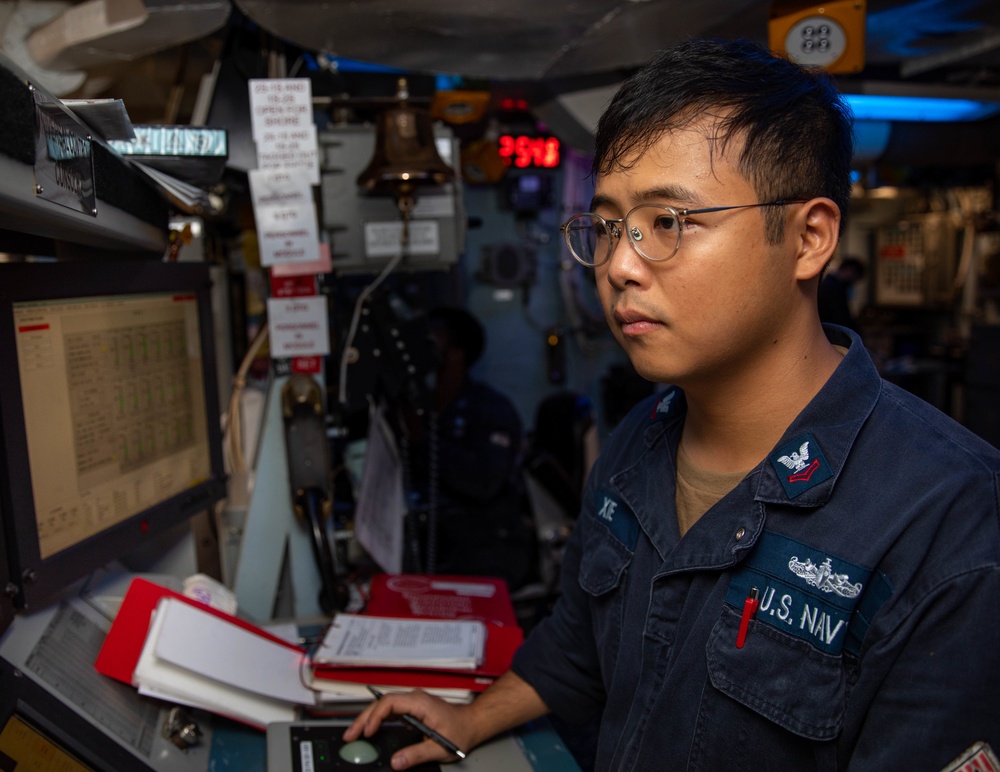 GSE2 Guojian Xie Mans the Propulsion Auxiliary Control Console Aboard the USS Barry